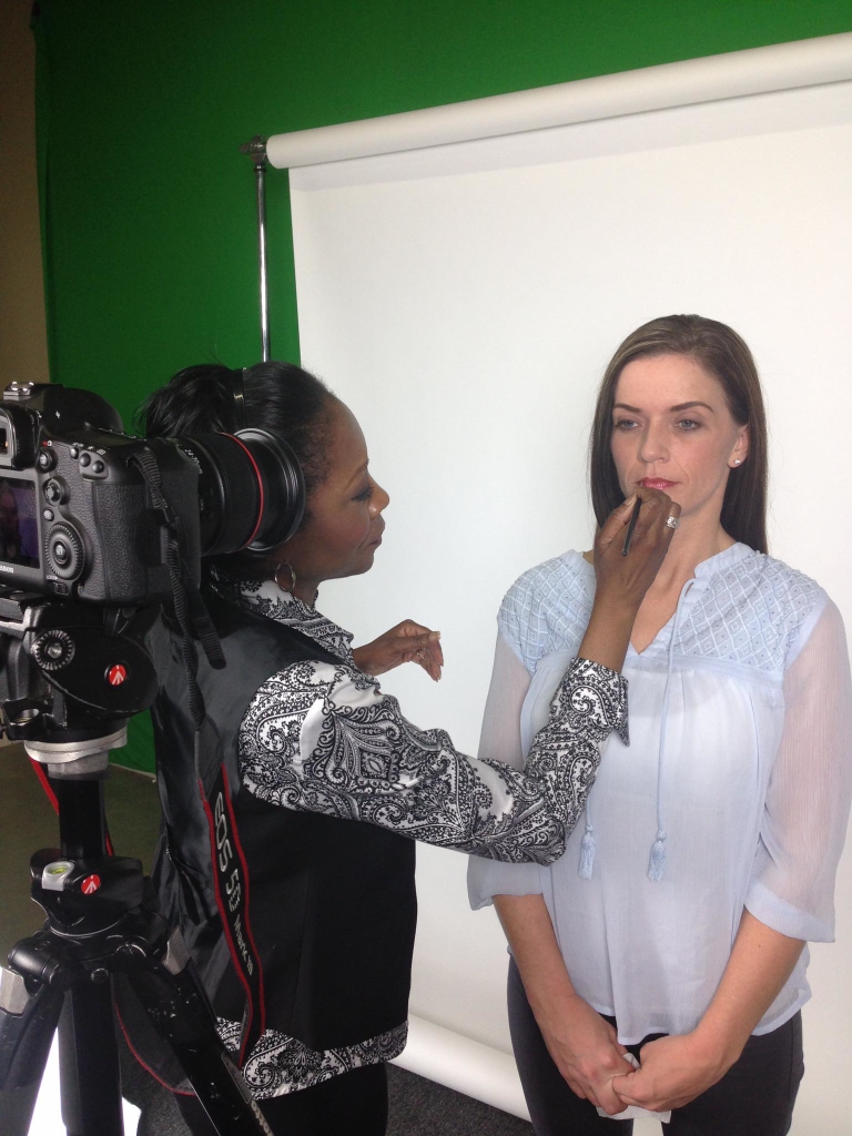 Jestina Howard preps a client for lights, camera and action. (Photo: Special) 