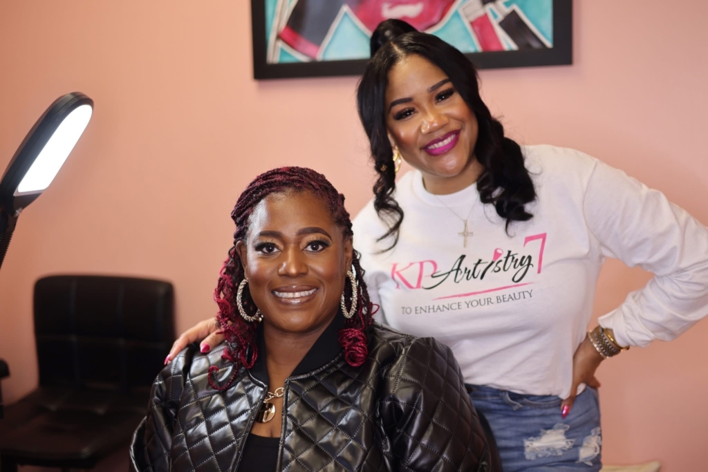Makeup artist Natasha Thomas-Peterson with breast cancer survivor Arica Etheridge. (Photo by Daniel Roth)