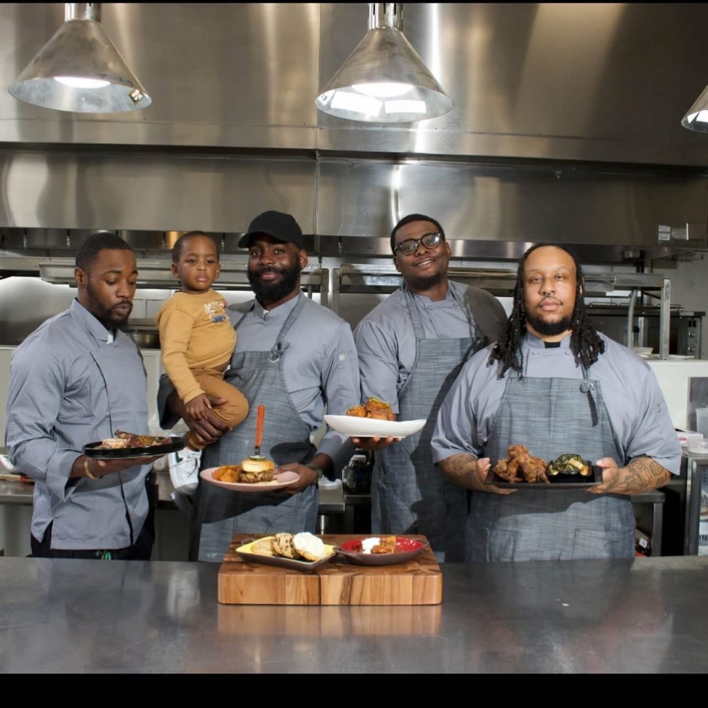 Hassan Gooden with his team at Velvet & Vine in Birmingham. (Photo from Hassan Gooden's Facebook page)